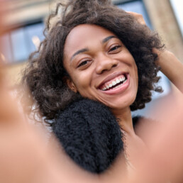 Cute young woman feeling happy and looking excited