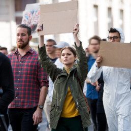 People with placards and posters on global strike for climate change.